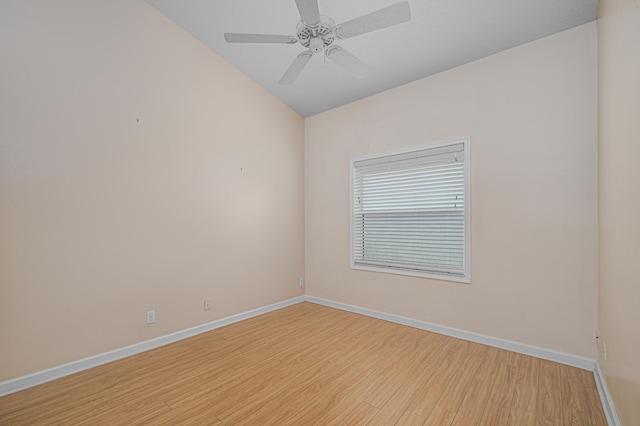 spare room with ceiling fan and light wood-type flooring