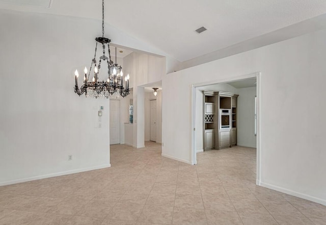 interior space featuring high vaulted ceiling, visible vents, and baseboards