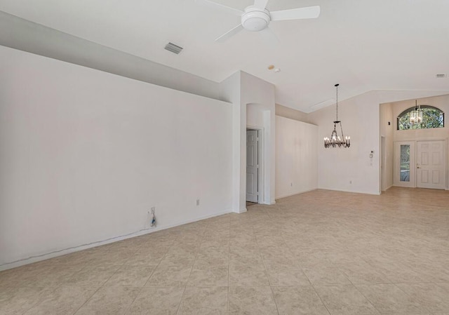 unfurnished living room featuring lofted ceiling, visible vents, and ceiling fan with notable chandelier