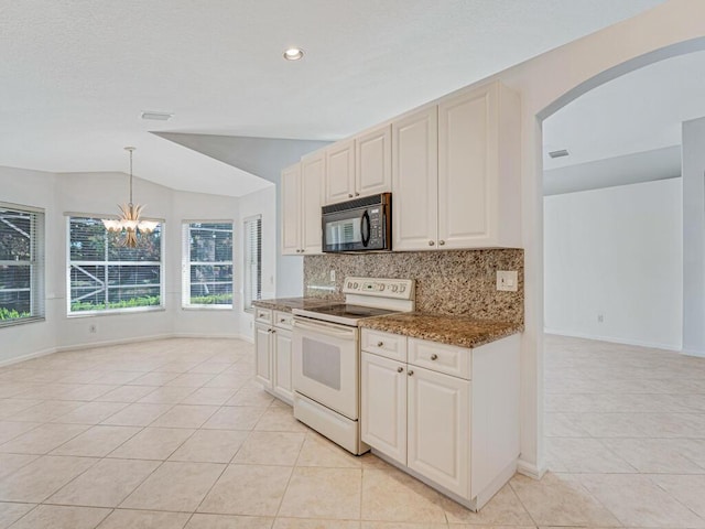 kitchen with black microwave, light tile patterned floors, a chandelier, backsplash, and white range with electric stovetop