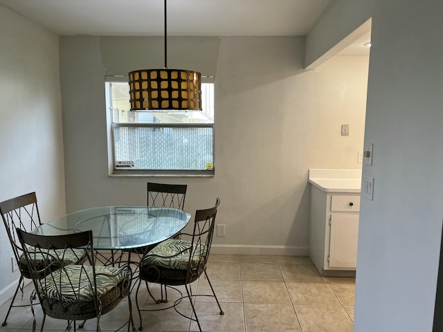 dining room featuring light tile patterned floors