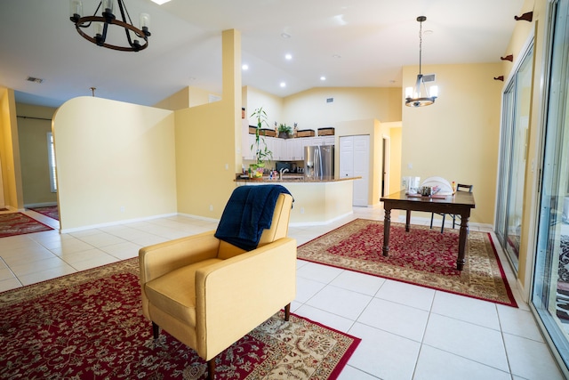 165 Cypress Trce, Royal Palm Beach, FL 33411 - living room featuring a chandelier, light tile patterned floors, high vaulted ceiling, and recessed lighting