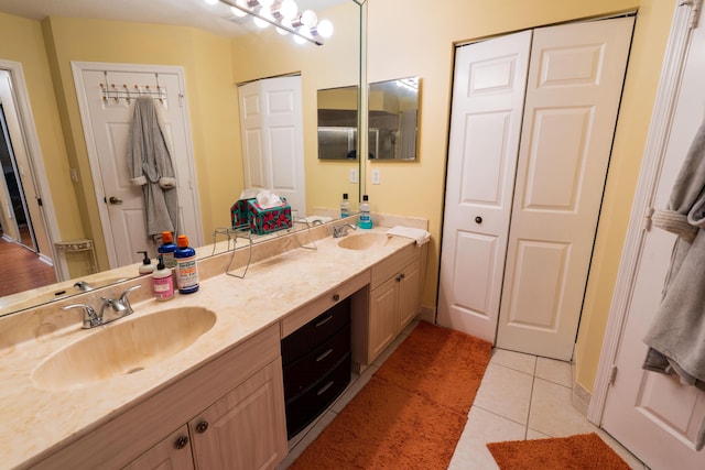 bathroom with vanity and tile patterned floors