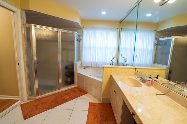 165 Cypress Trce, Royal Palm Beach, FL 33411 - full bath with a stall shower, vanity, a bath, and tile patterned flooring