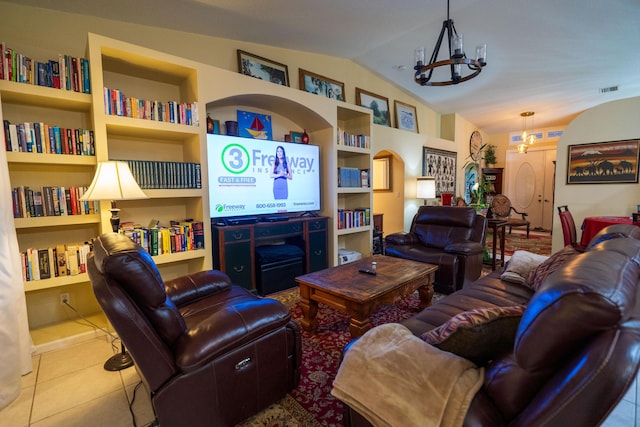 tiled living room featuring vaulted ceiling, a notable chandelier, and built in features