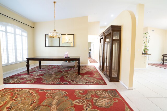 165 Cypress Trce, Royal Palm Beach, FL 33411 - home office with light tile patterned floors, a chandelier, baseboards, and lofted ceiling