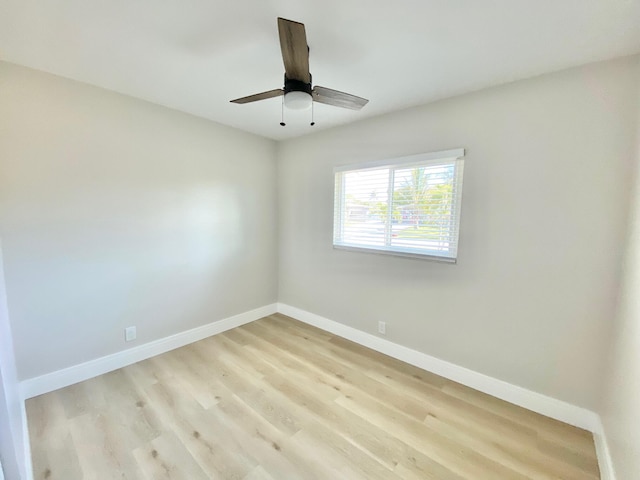 unfurnished room with light hardwood / wood-style floors and ceiling fan