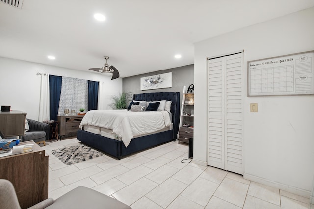 bedroom featuring light tile patterned flooring