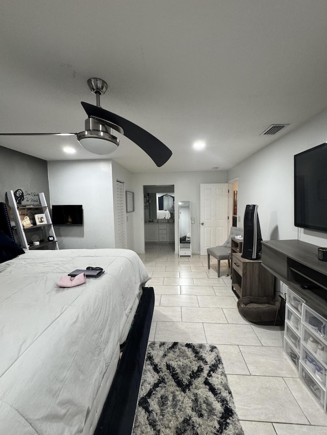 tiled bedroom with ceiling fan