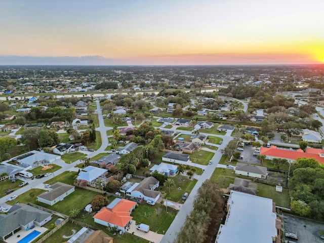 view of aerial view at dusk