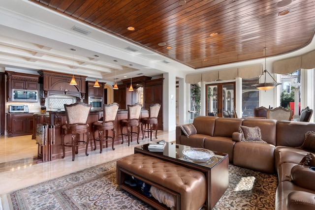 living room with french doors, a raised ceiling, and wooden ceiling