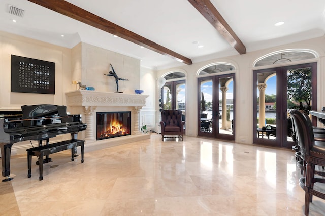 interior space featuring french doors and beam ceiling