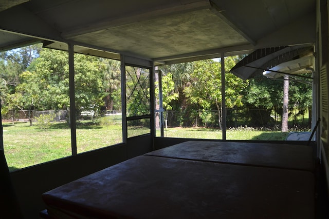 unfurnished sunroom featuring healthy amount of natural light