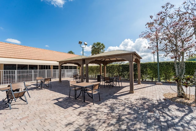 view of community with a gazebo and a patio