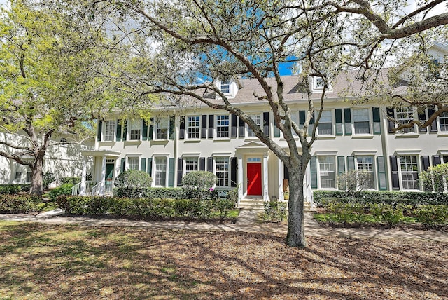 view of front of house featuring stucco siding