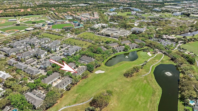 aerial view featuring a water view, a residential view, and golf course view