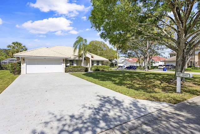 single story home with a garage and a front lawn