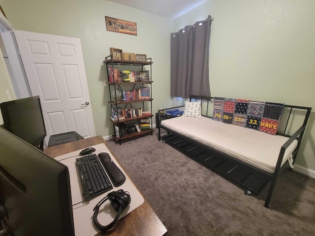 bedroom with baseboards and carpet flooring