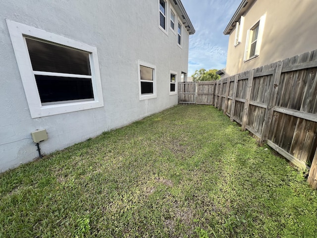 view of yard featuring a fenced backyard