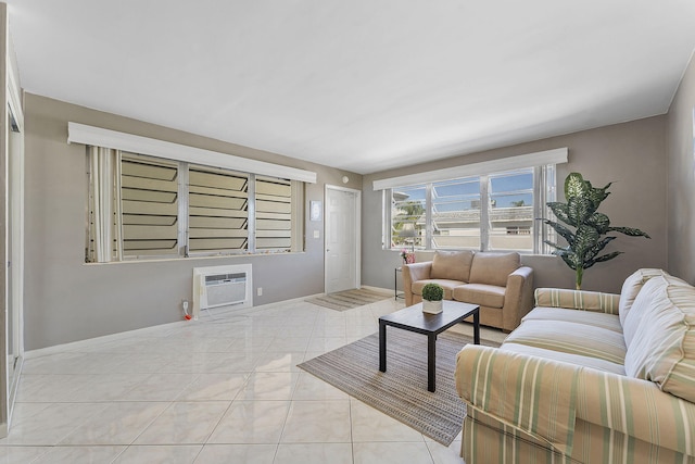 tiled living room featuring an AC wall unit