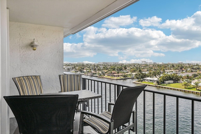 balcony featuring a water view