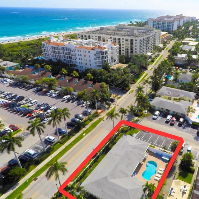 aerial view with a beach view and a water view