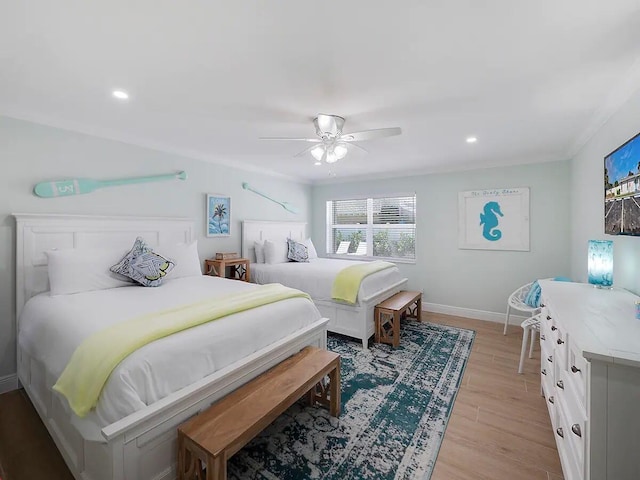 bedroom featuring ceiling fan and light wood-type flooring