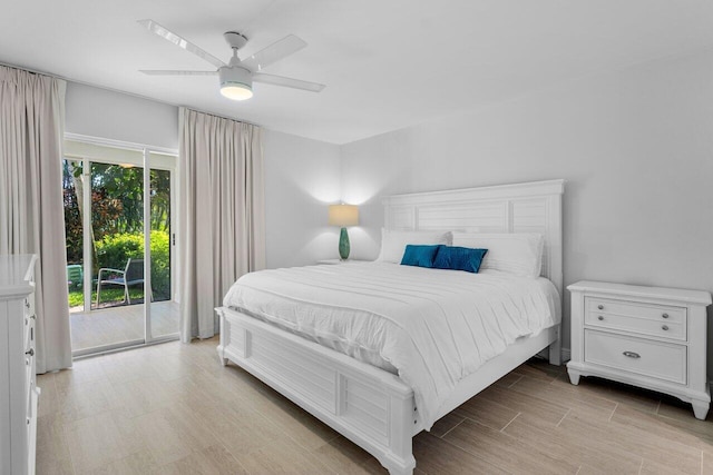 bedroom featuring ceiling fan, light hardwood / wood-style floors, and access to outside