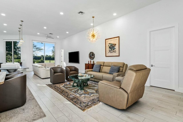 living room with light hardwood / wood-style floors