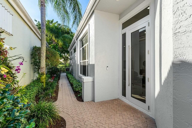 property entrance with a patio