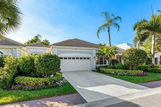 view of front of property featuring a garage