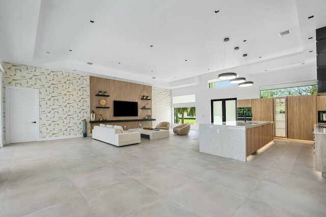 751 Pelican Way, North Palm Beach, FL 33408 - living room featuring concrete floors