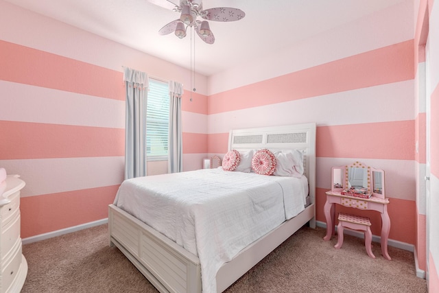 bedroom with ceiling fan and carpet flooring