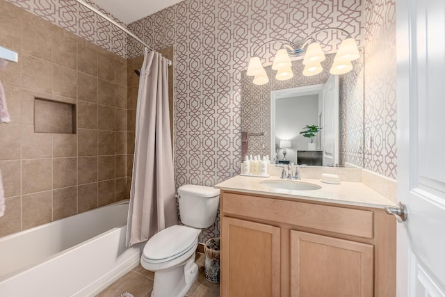 full bathroom with tile patterned flooring, vanity, shower / tub combo, and toilet