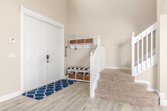 mudroom with hardwood / wood-style flooring