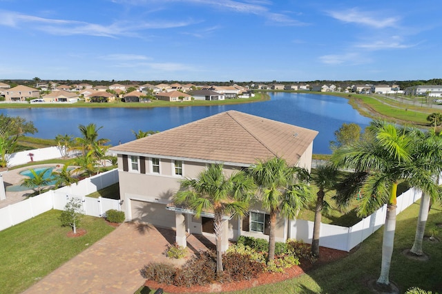 bird's eye view with a water view