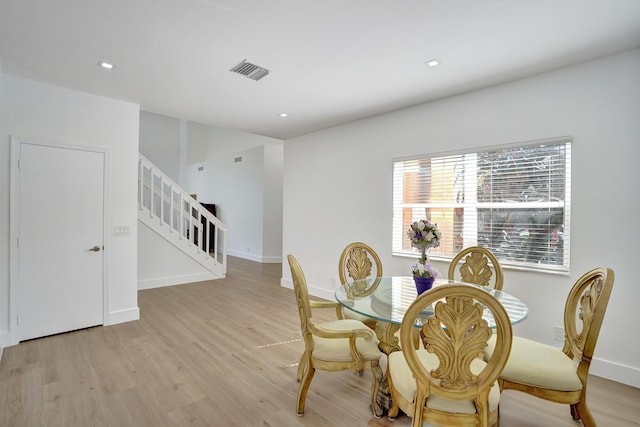 dining room featuring light hardwood / wood-style floors