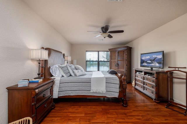 bedroom featuring dark wood-type flooring and ceiling fan