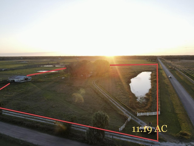 600 NW 344th St, Okeechobee, FL 34972 - aerial view at dusk with a rural view