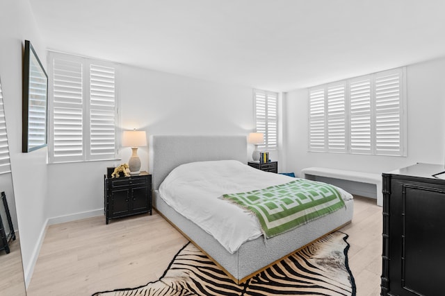 bedroom featuring light wood-type flooring