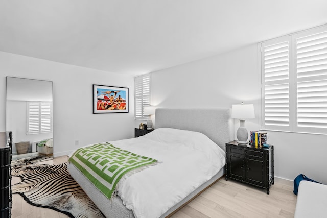 bedroom featuring light wood-type flooring