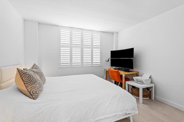 bedroom featuring light wood-type flooring