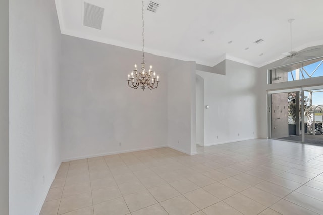 empty room featuring ceiling fan with notable chandelier, visible vents, and crown molding