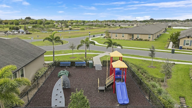 community jungle gym featuring a residential view