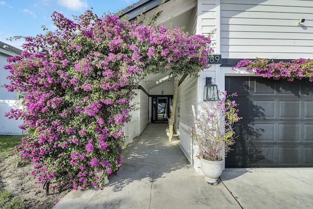 entrance to property featuring a garage