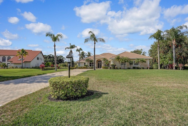 view of front of home with a front yard