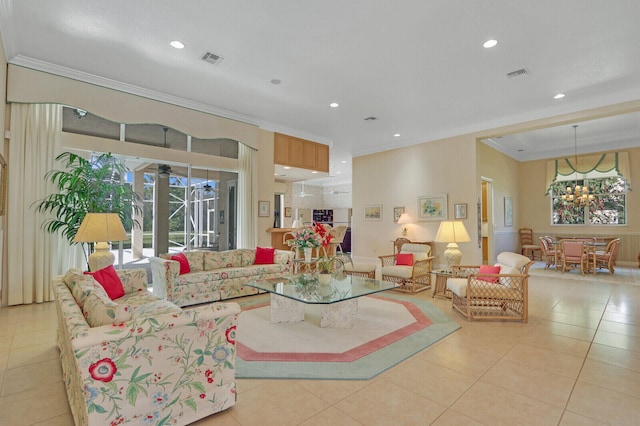 tiled living room featuring crown molding and a healthy amount of sunlight