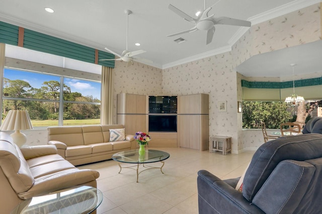 living room featuring crown molding, ceiling fan with notable chandelier, and light tile patterned flooring