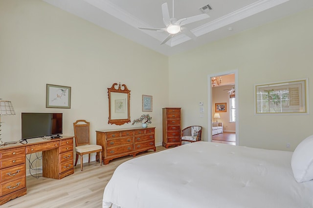 bedroom with crown molding and light wood-type flooring