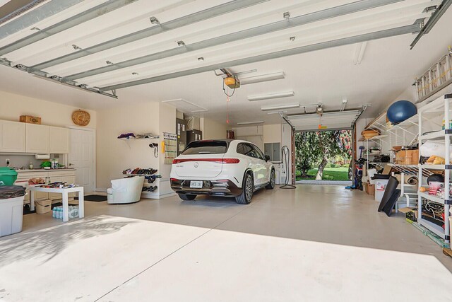 garage featuring a garage door opener